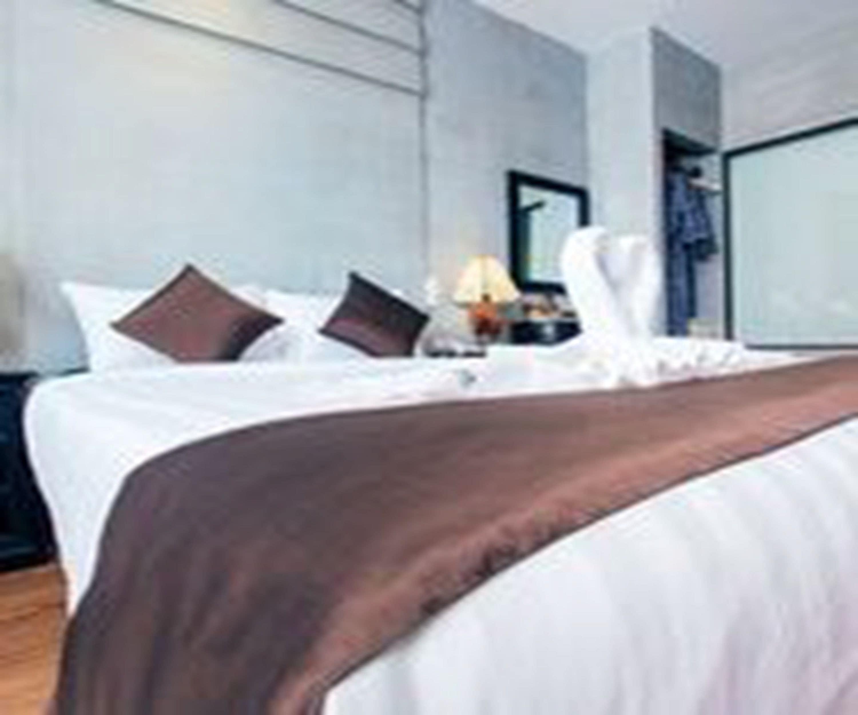 deluxe double room, balcony | minibar, in-room safe, desk, blackout curtains