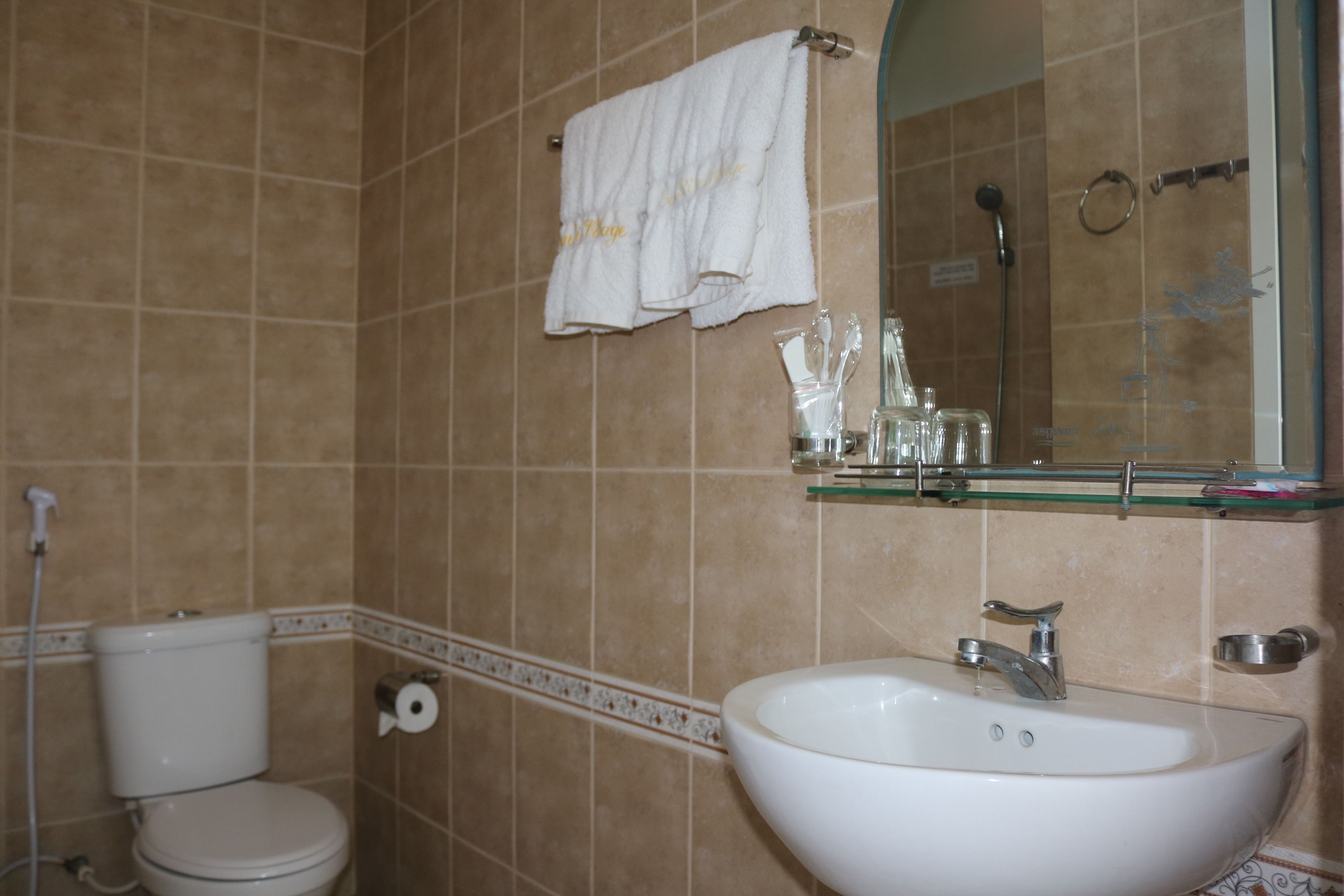 shower, free toiletries, slippers, towels