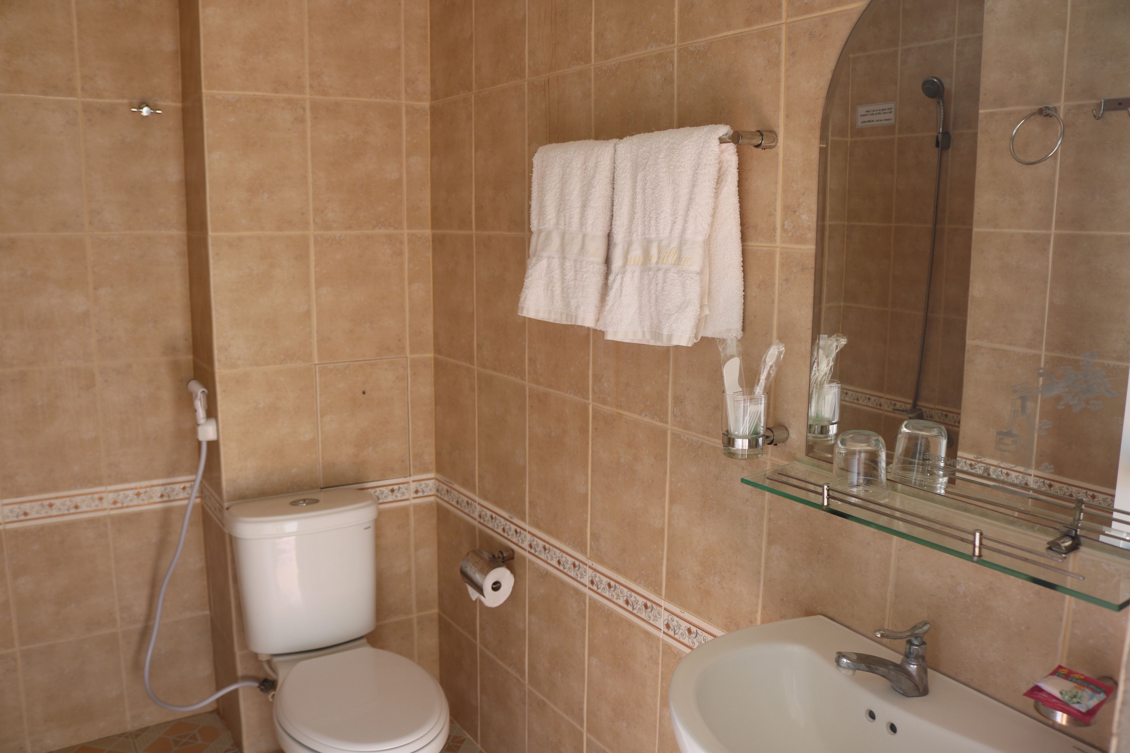 shower, free toiletries, slippers, towels