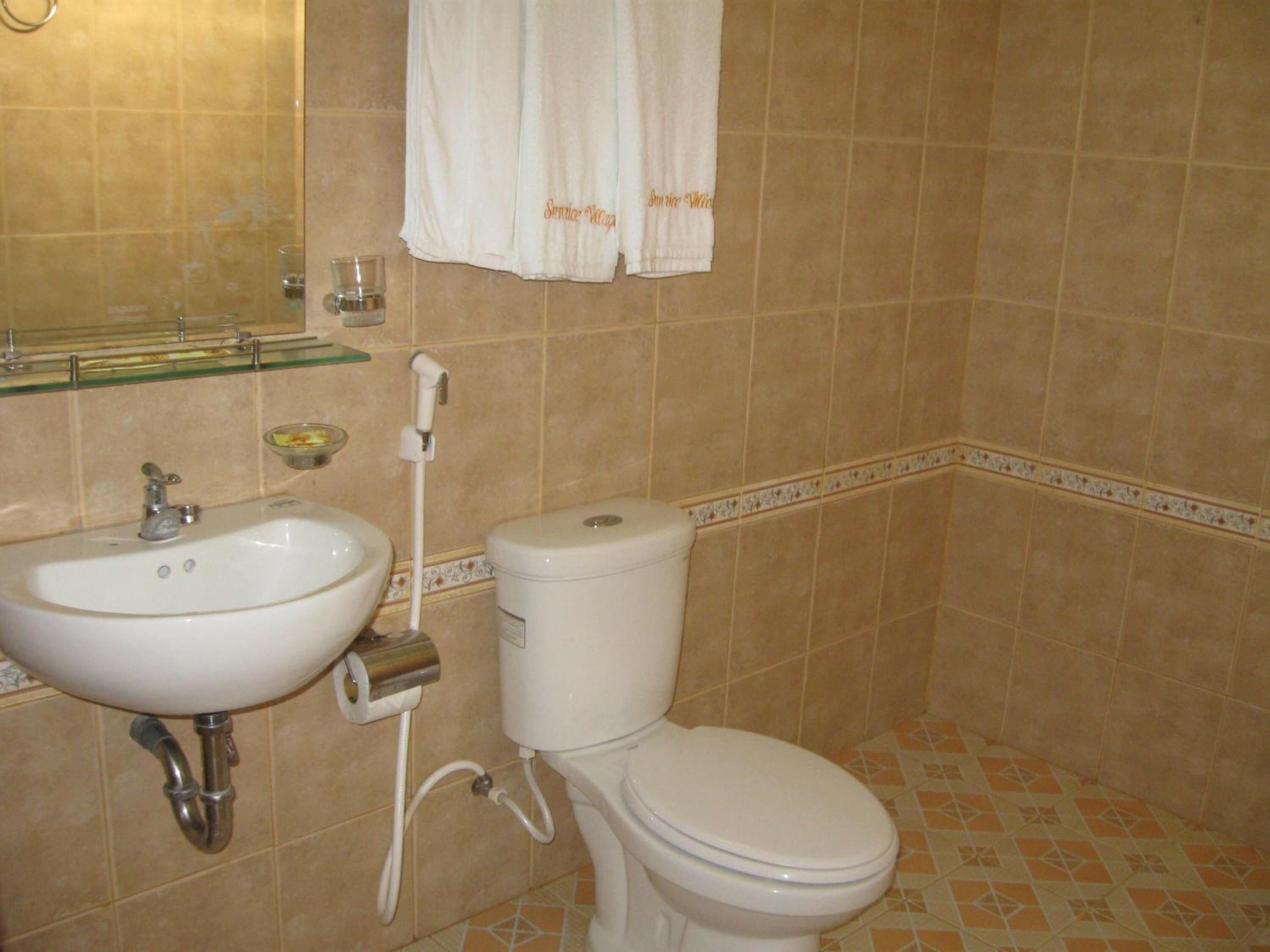 shower, free toiletries, slippers, towels