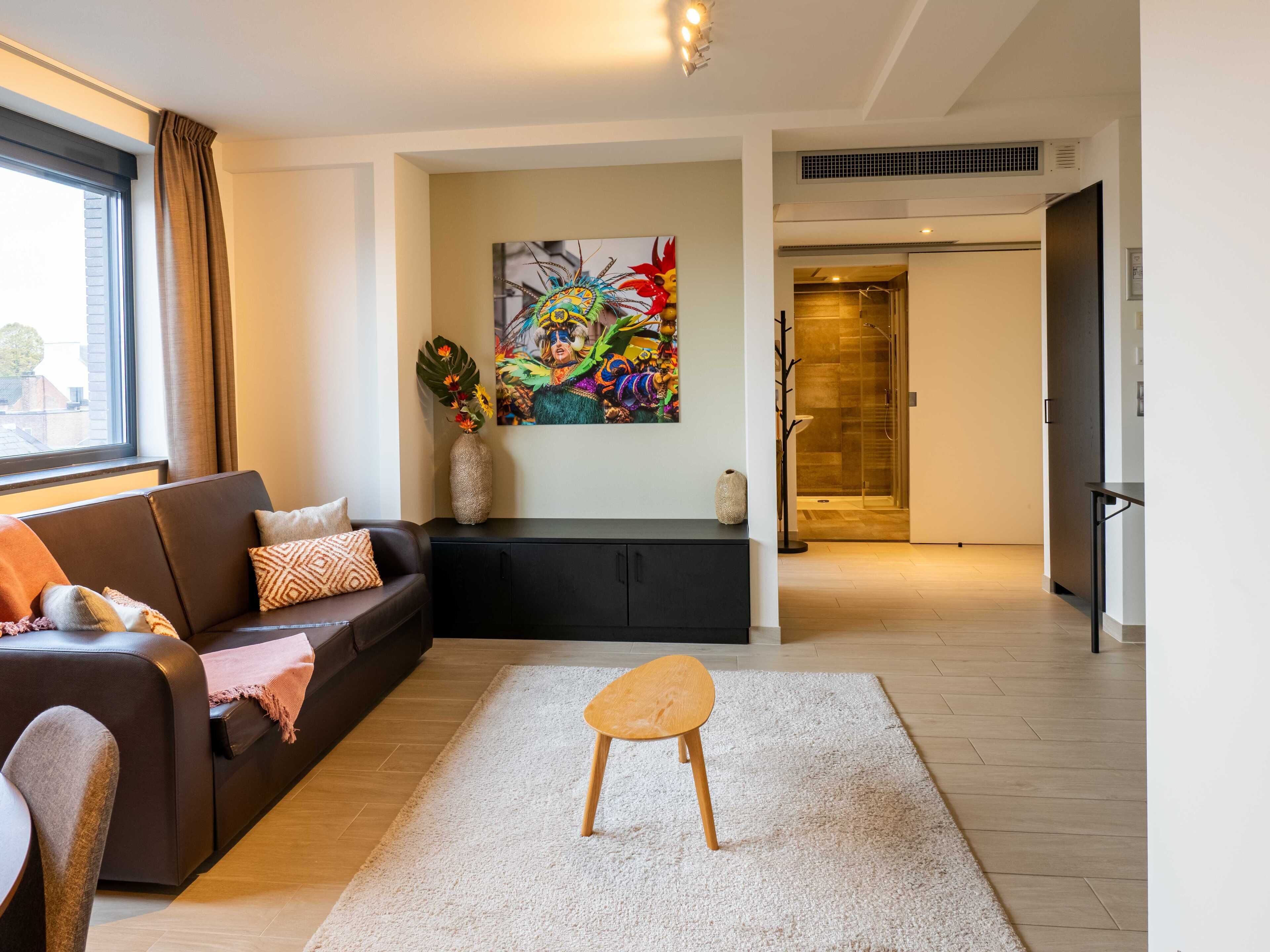 Family Apartment | Minibar, in-room safe, laptop workspace, blackout drapes