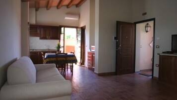 Suite estudio | Área de sala de estar