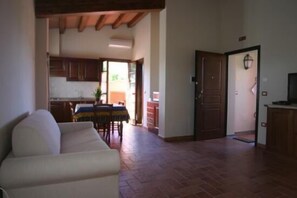 Suite estudio | Área de sala de estar
