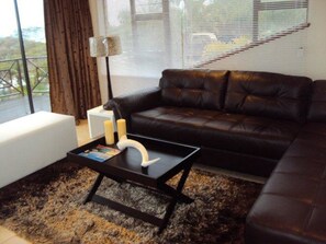 Vila luxo, para não fumantes, vista para o jardim | Sala de estar | TV de tela plana