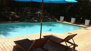 Seasonal outdoor pool, pool umbrellas, sun loungers