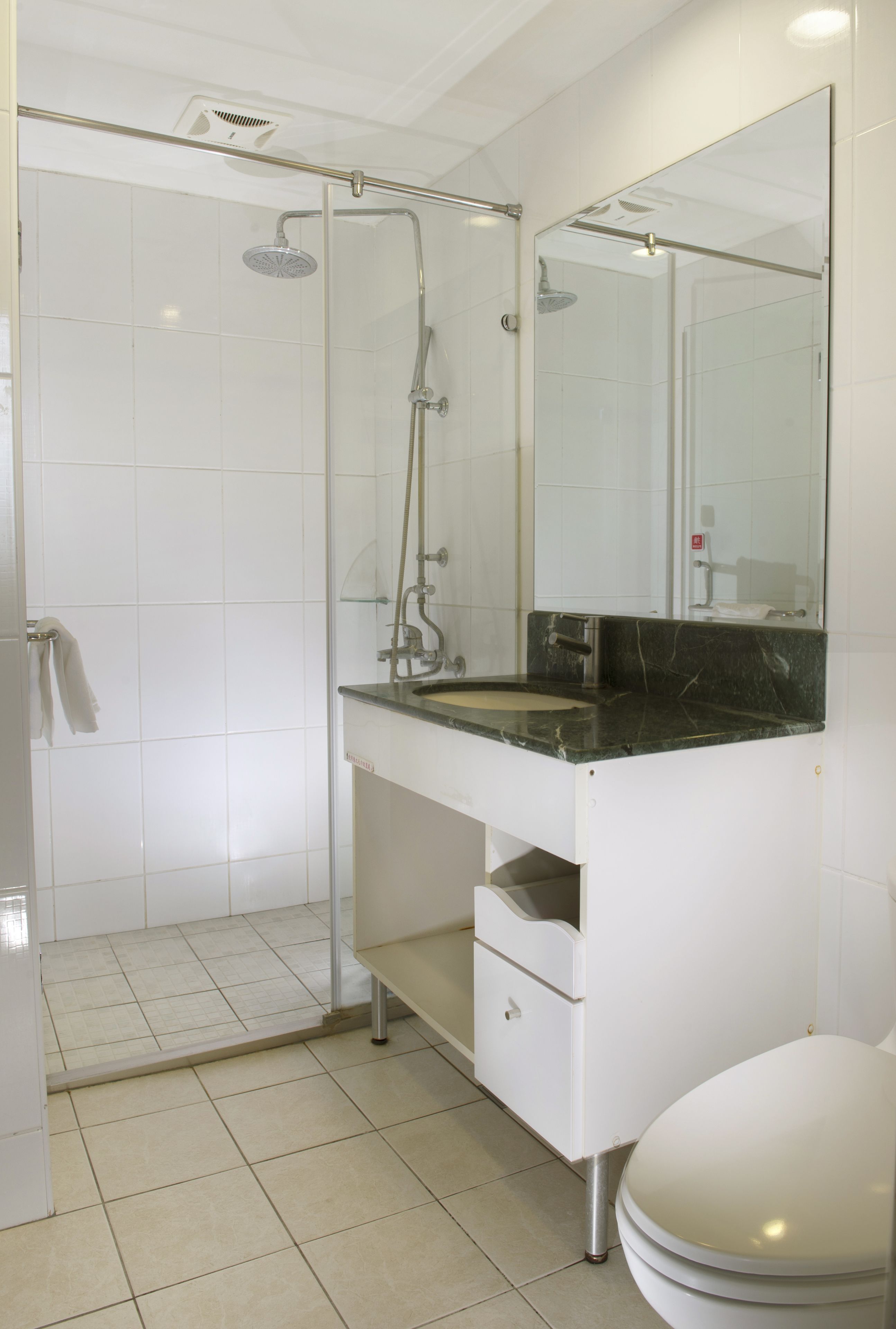 quadruple room | bathroom | shower, rainfall showerhead, free toiletries, hair dryer