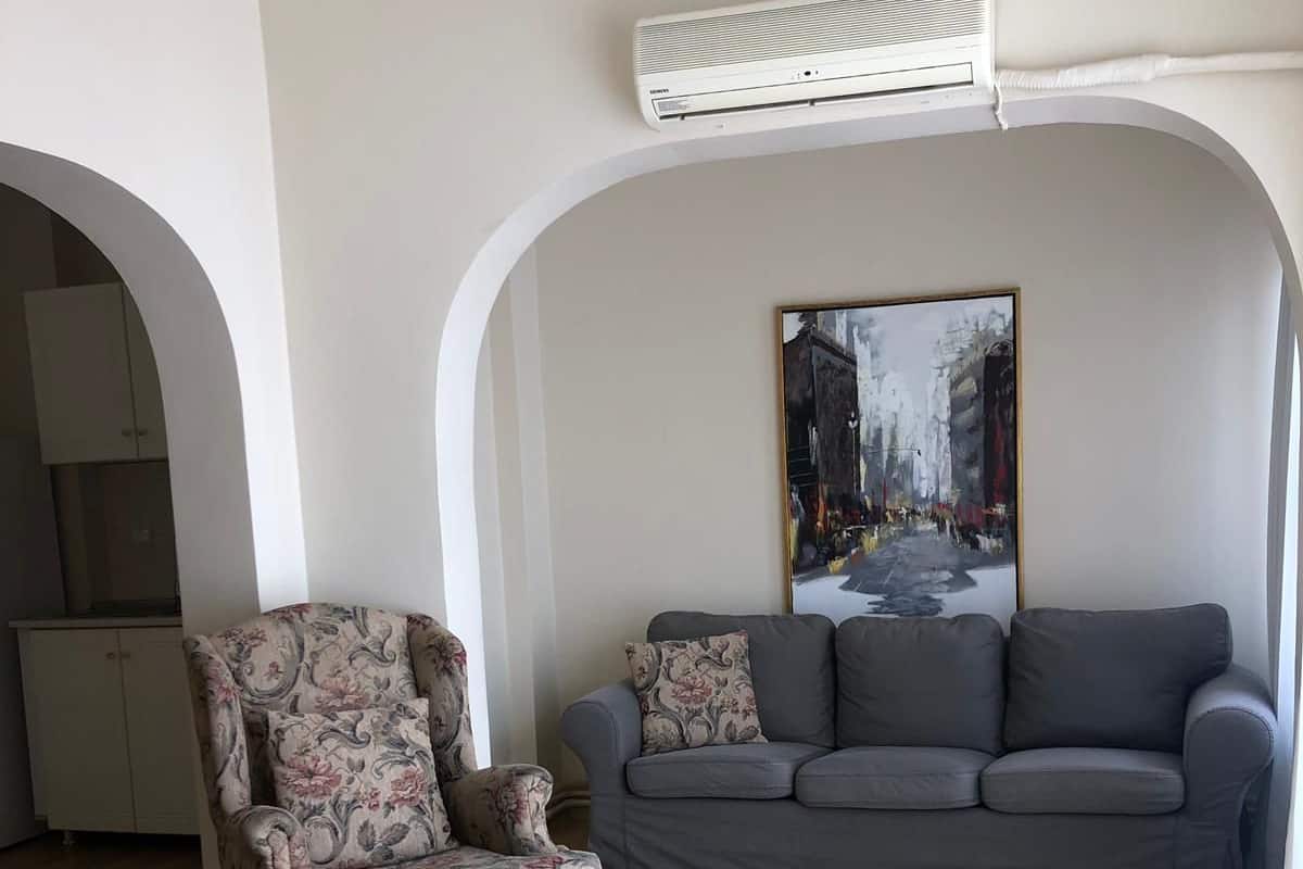 Classic Apartment, Balcony | Living area | 50-inch LCD TV with cable channels, TV, streaming services
