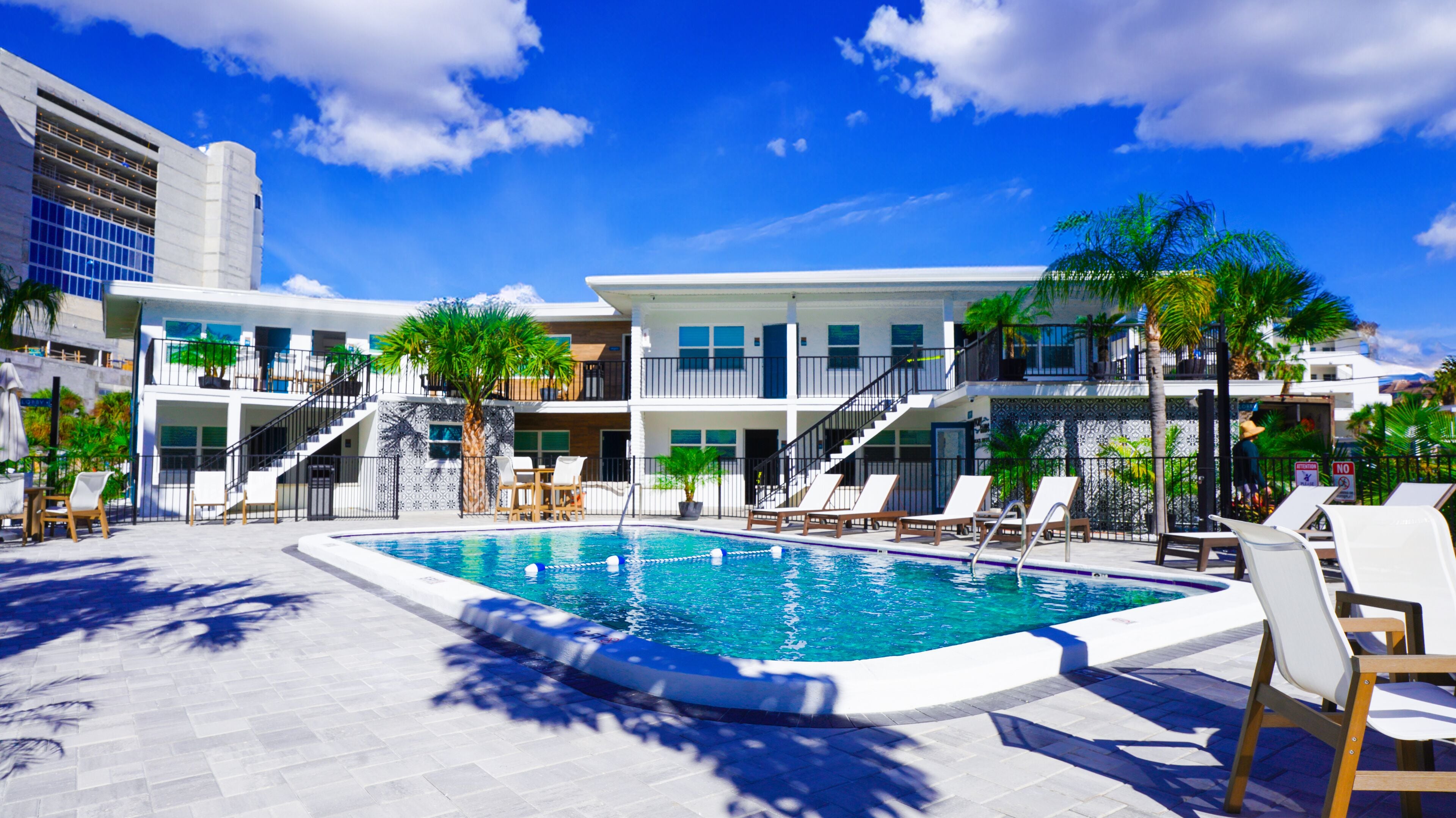 Outdoor pool, pool umbrellas, pool loungers