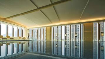 Indoor pool, open 6:00 AM to 11:00 PM, sun loungers, lifeguards on site