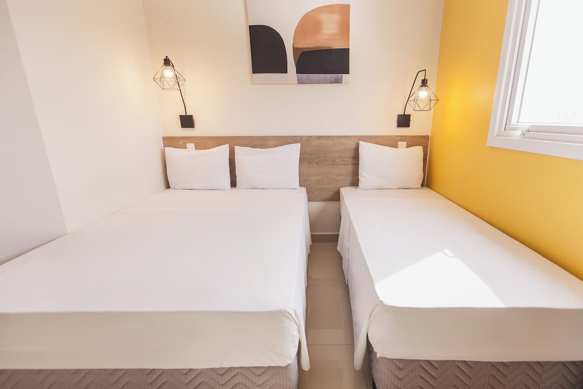 family triple room | 1 bedroom, minibar, desk, blackout curtains