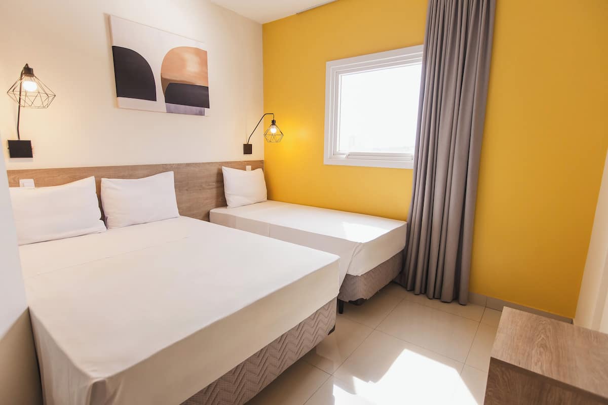 Family Triple Room | Minibar, desk, blackout curtains, soundproofing