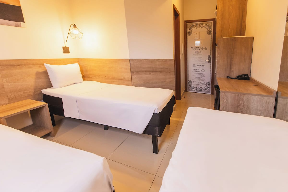 standard triple room | 1 bedroom, minibar, desk, blackout curtains