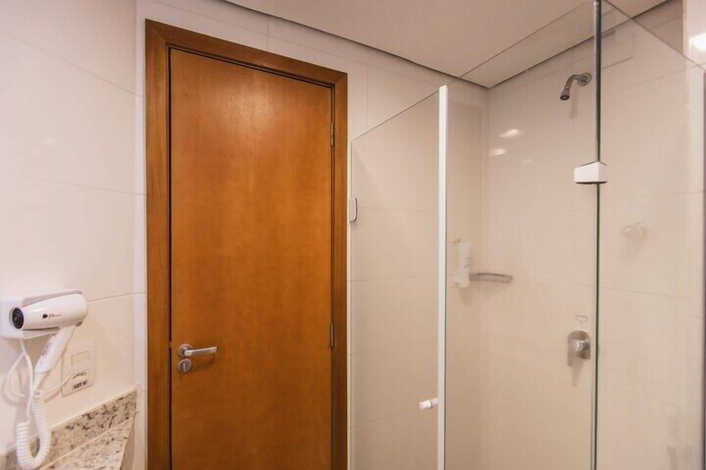 shower, eco-friendly toiletries, slippers, towels