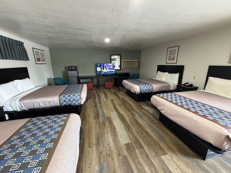 Deluxe Quadruple Room, 1 Bedroom | WiFi (free), bed sheets