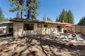 A single-story house with a covered patio area.