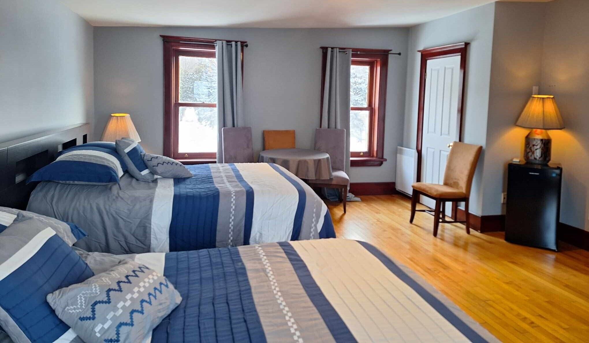 Premium bedding, blackout drapes, iron/ironing board