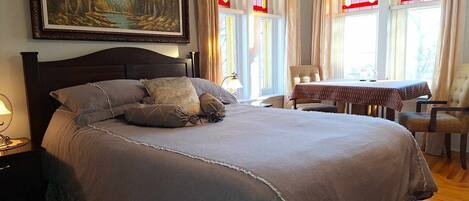 Premium bedding, blackout drapes, iron/ironing board