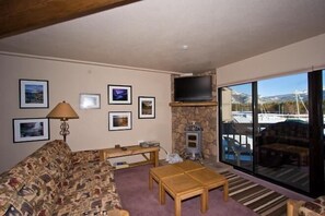 Condo, 3 Bedrooms, Lakeside | Living area | TV, fireplace, DVD player