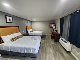 Room, 2 Queen Beds | Desk, laptop workspace, iron/ironing board, free WiFi
