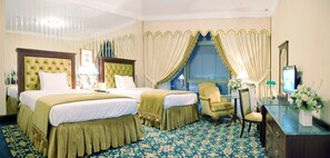 Premium Suite | 1 bedroom, premium bedding, free minibar items, in-room safe