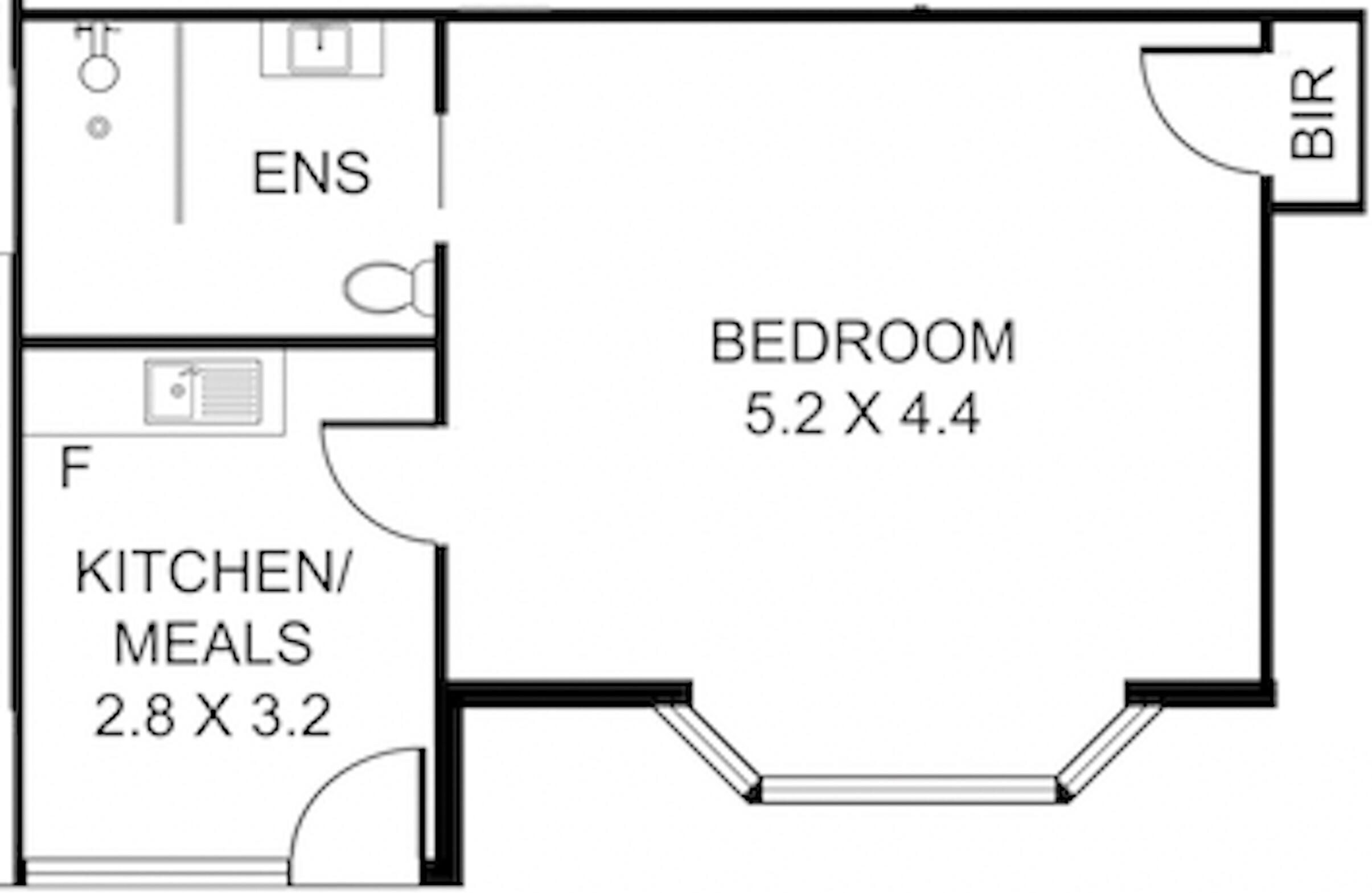 Un plan d’étage comprenant une chambre de 5,2 m x 4,4 m, une cuisine/coin repas de 2,8 m x 3,2 m, une salle de bain attenante et une pièce avec placard intégré.