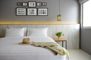Deluxe Double Room, Sea View | In-room safe, desk, laptop workspace, blackout drapes