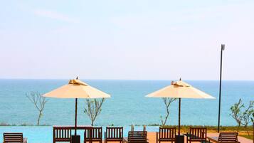 Outdoor pool, free cabanas, pool umbrellas