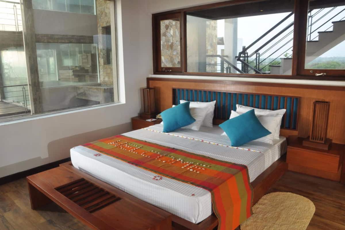 Deluxe kamer | Luxe beddengoed, donzen dekbedden, een minibar, een kluis op de kamer