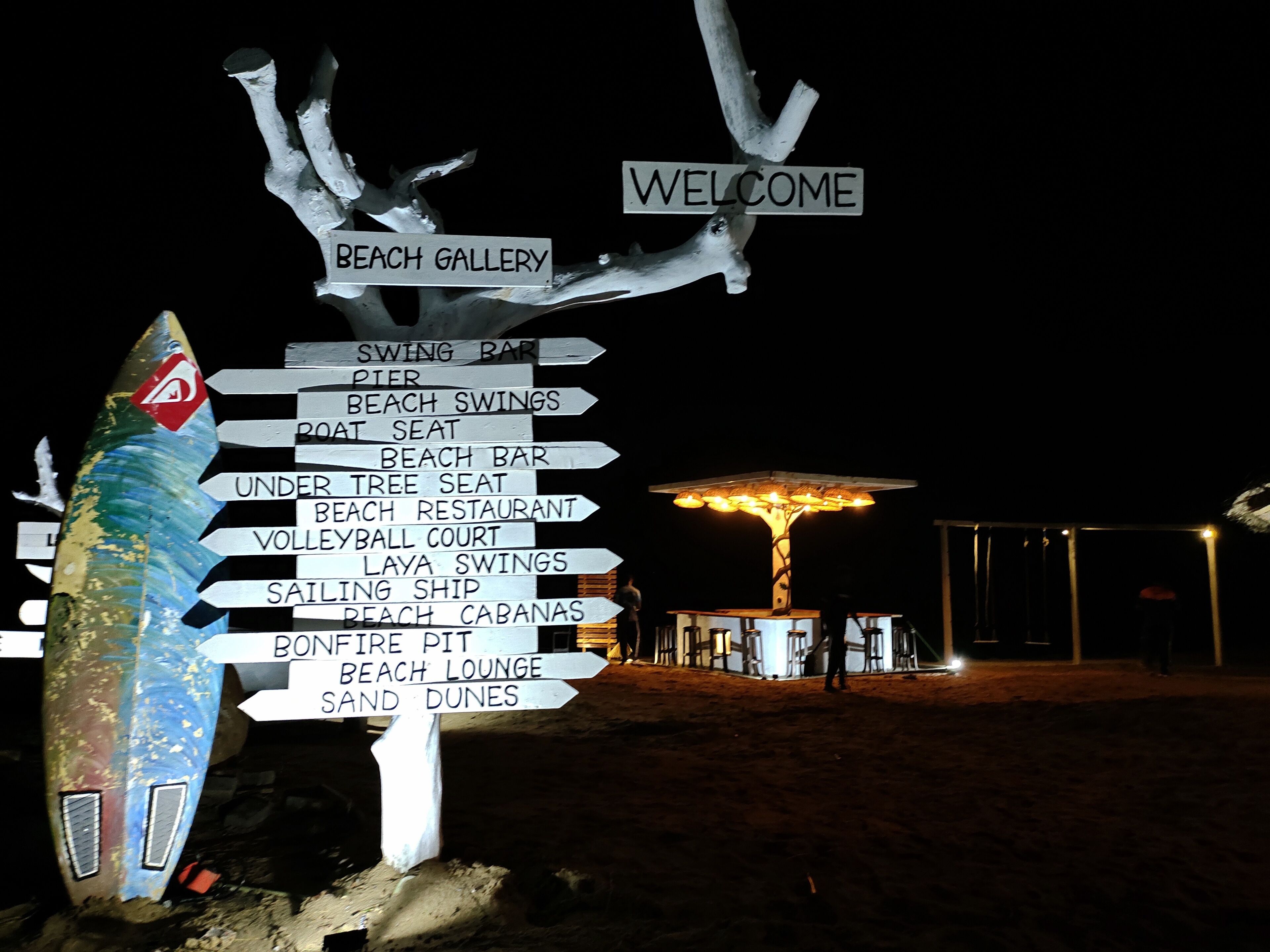 on the beach, white sand, sun-loungers, beach umbrellas