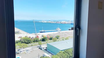 Down duvets, desk, laptop workspace, blackout curtains