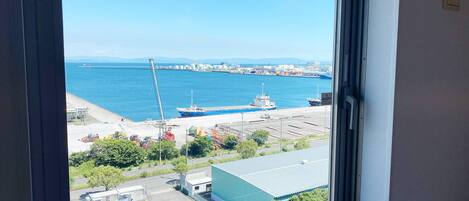 Down duvets, desk, laptop workspace, blackout curtains