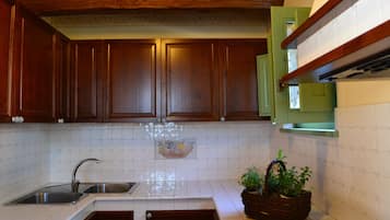 Comfort Apartment, 1 Bedroom | Private kitchen | Full-size fridge, stovetop, coffee/tea maker, electric kettle