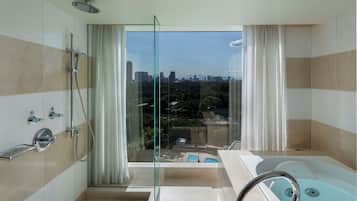 Executive Garden Suite, Non Smoking | Bathroom | Combined shower/tub, deep soaking tub, designer toiletries, hair dryer