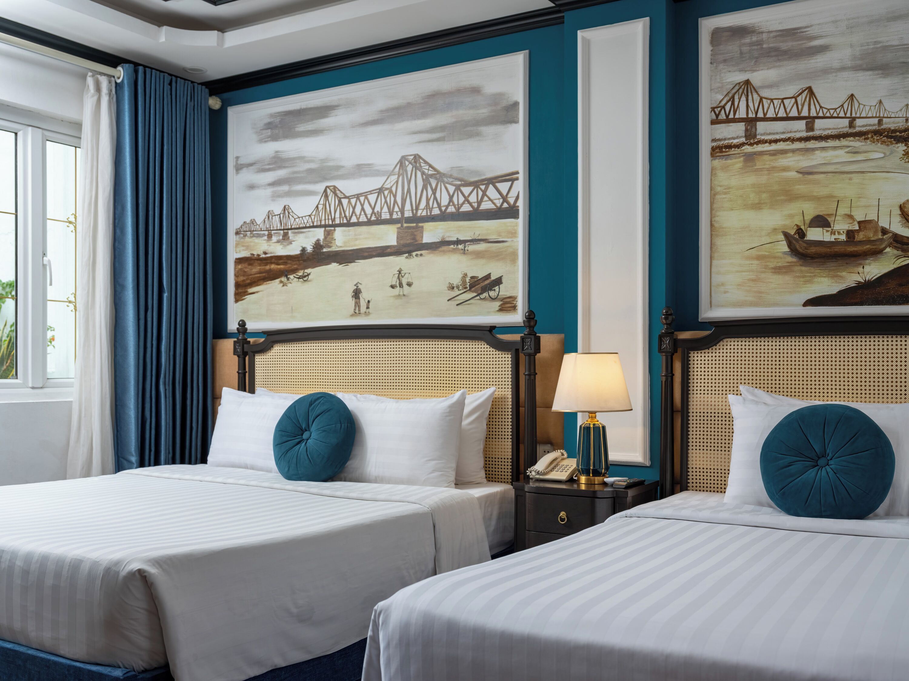 Family Triple Room, Bathtub, City View | Minibar, in-room safe, individually decorated, desk