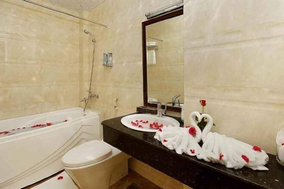 Shower, free toiletries, hair dryer, slippers