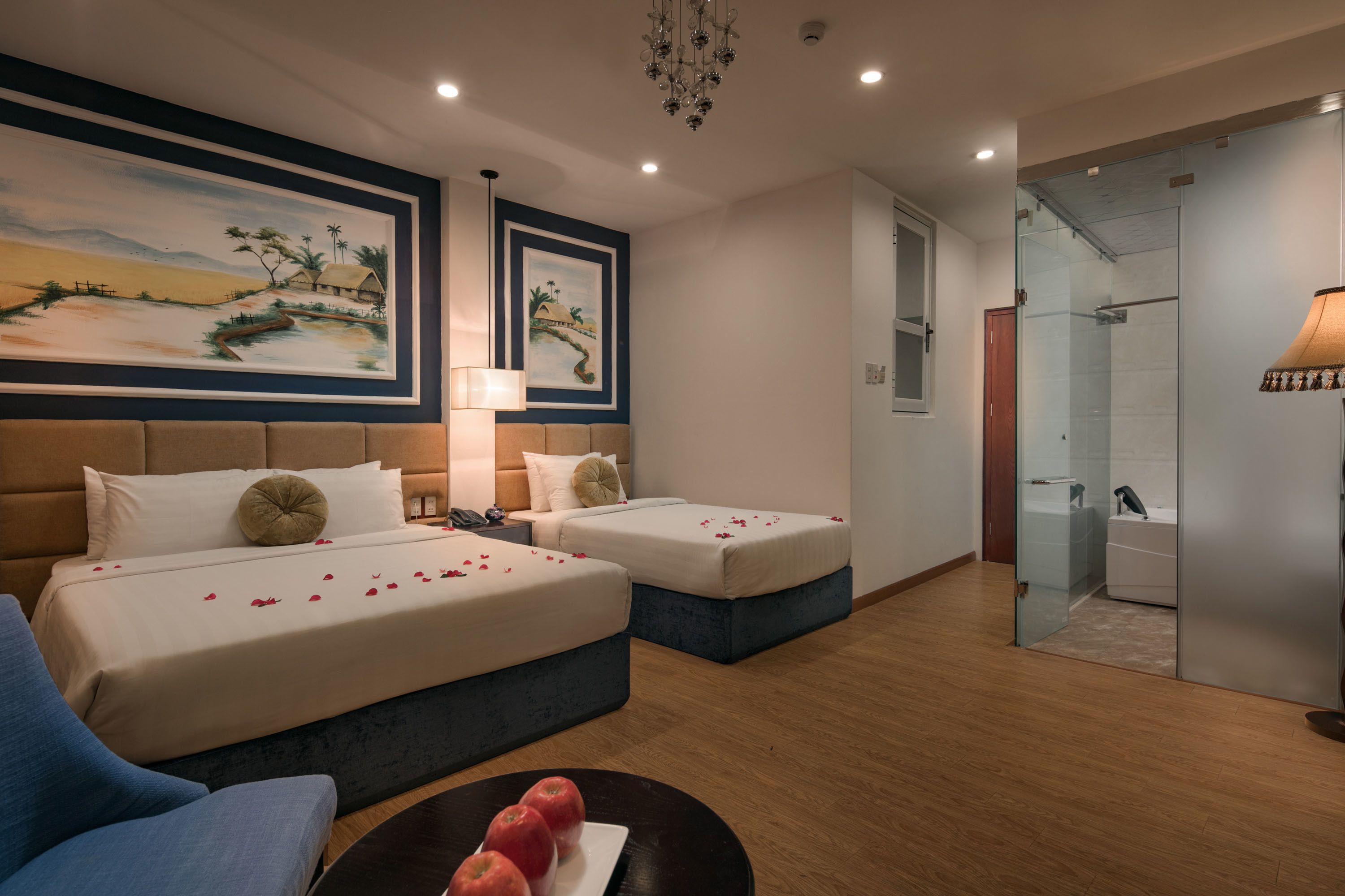 family triple room, bathtub, city view | minibar, in-room safe, individually decorated, desk