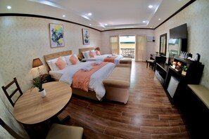 Deluxe Quadruple Room, Multiple Beds | Desk, blackout drapes, free WiFi, bed sheets