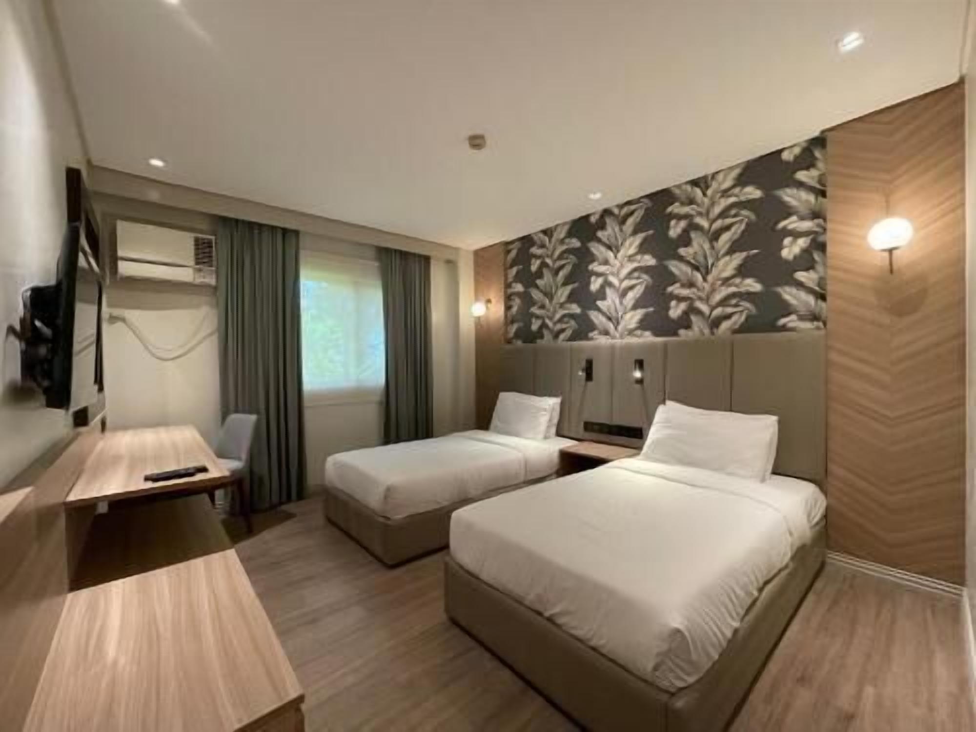 Desk, blackout curtains, free WiFi, bed sheets