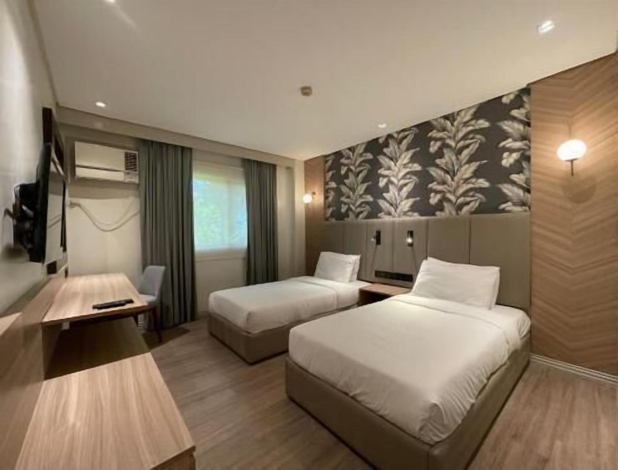 Desk, blackout drapes, free WiFi, bed sheets