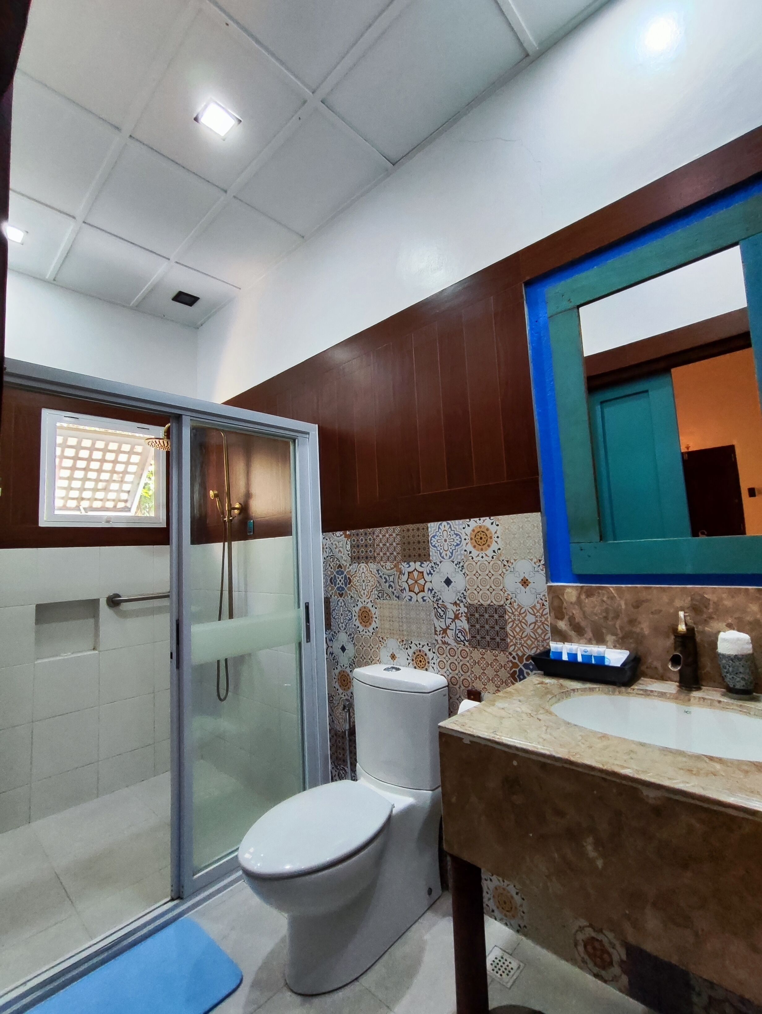 superior room | bathroom | shower, rainfall showerhead, free toiletries, hair dryer