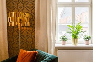 Premium Suite, 1 Bedroom, Private Bathroom, City View | Living area | 42-inch flat-screen TV with satellite channels, TV