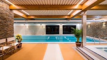 Indoor pool, open 10:00 AM to 8:00 PM, pool loungers