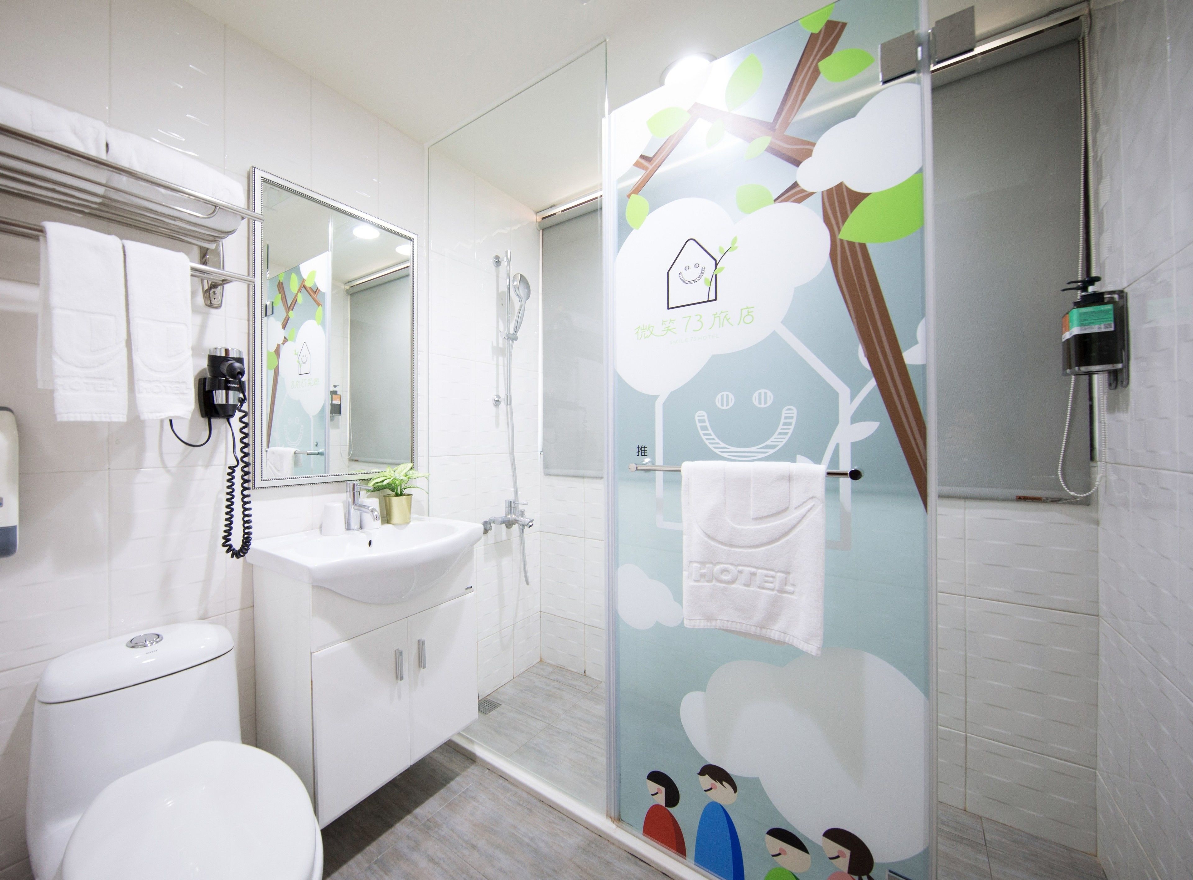 deluxe double room | bathroom amenities | shower, hair dryer, towels