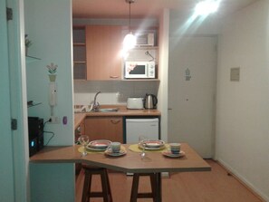 Fridge, microwave, stovetop, electric kettle