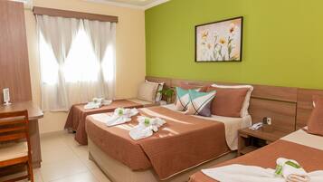 Quadruple Room | Minibar, desk, iron/ironing board, free cribs/infant beds