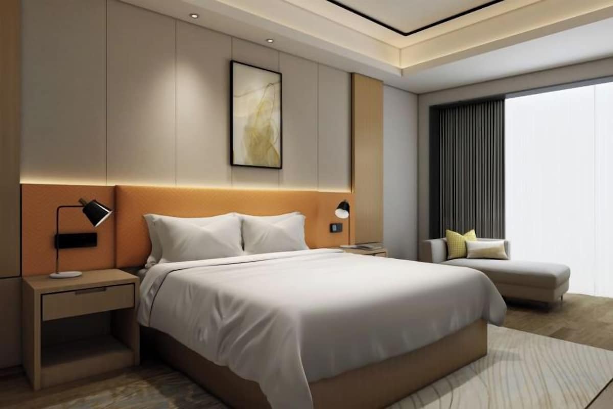 Premium bedding, down comforters, pillowtop beds, minibar