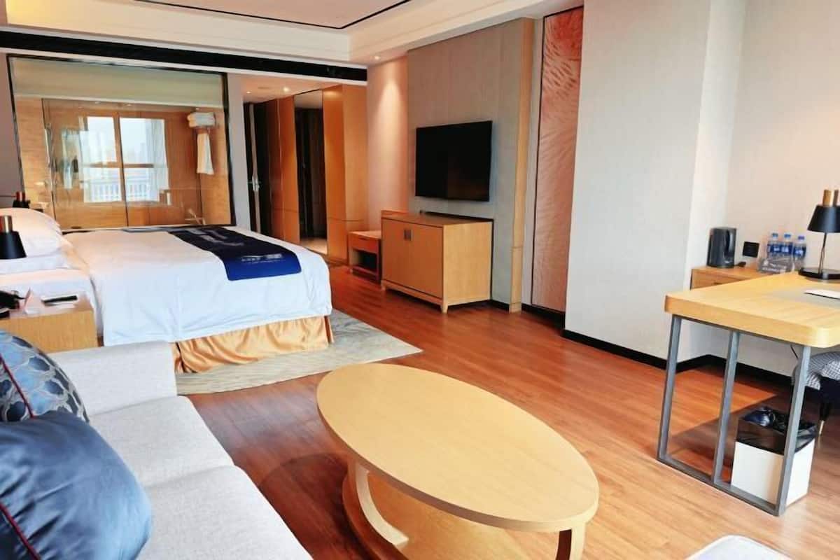 Premium bedding, down comforters, pillowtop beds, minibar