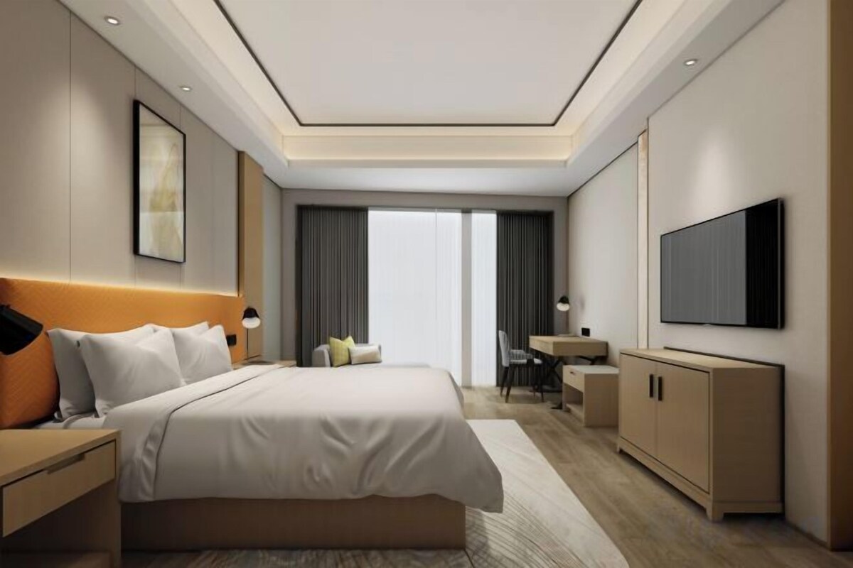 Premium bedding, down comforters, pillowtop beds, minibar