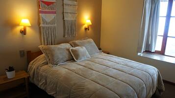 Premium bedding, down duvets, individually decorated