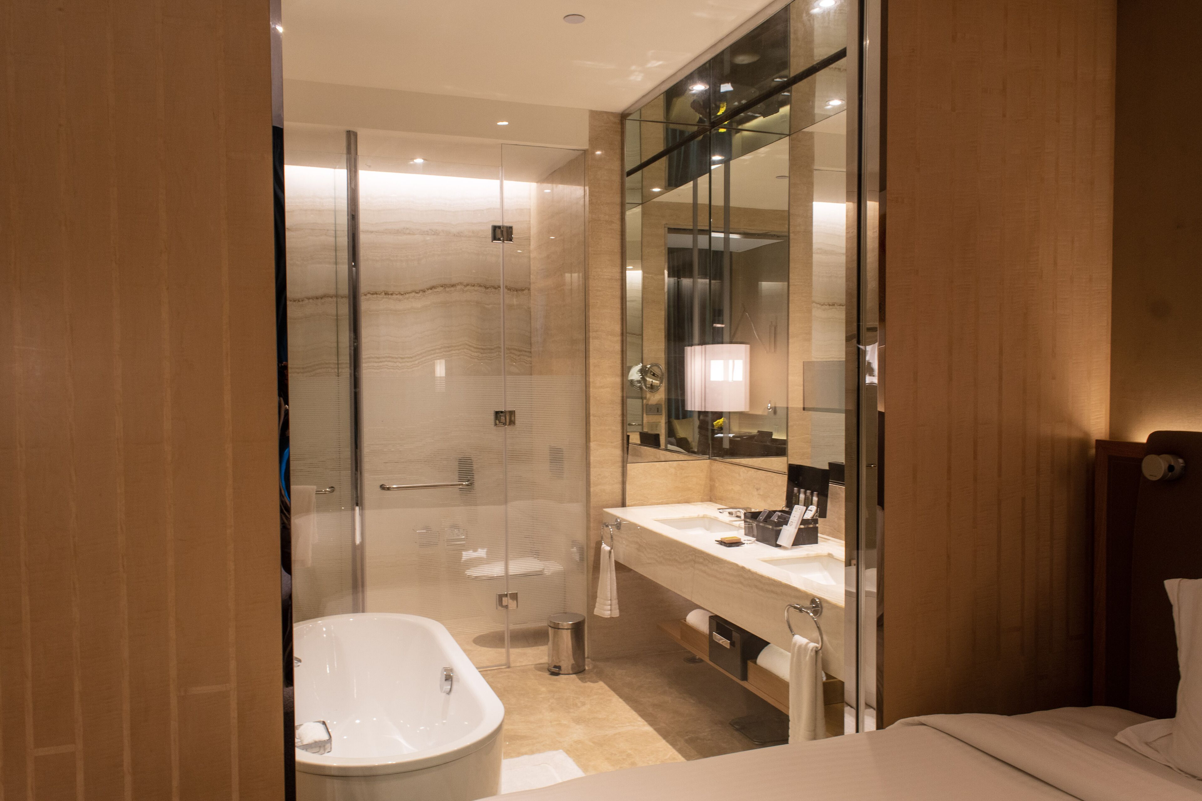 separate bathtub and shower, deep-soaking bathtub, rainfall showerhead